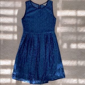 Sleeveless knee length blue dress